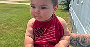 Haddie joined the competition — help win amazing prizes! baby, child, red_bow, red_tank_top, blue_eyes, tattoo, arm, outdoor, grass, daylight, person, cute, summer_clothing, denim_shorts, wooden_rail, greenery, portrait, infant, casual, holding
