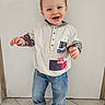 Alessio a rejoint le concours — aidez-le/la à gagner de superbes lots ! baby, casual_clothing, child, cute, expression, feet, floor, hands, happy, indoor, jeans, person, portrait, shirt, smiling, socks, standing, tile, toddler, young_child