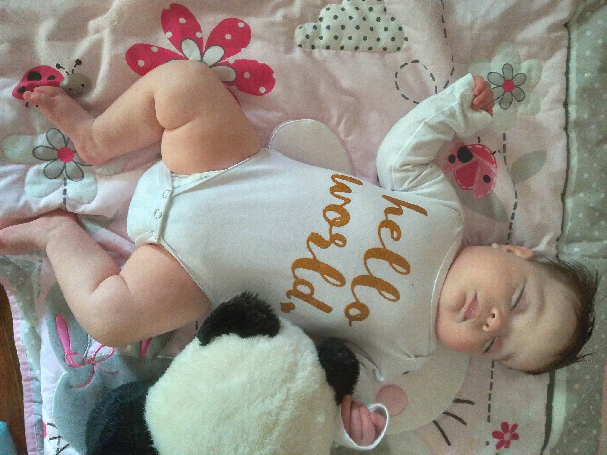 Korra is registered to the contest to win money with this photo: abdomen, arm, chest, child, comfort, fashion_accessory, fawn, flesh, human_body, human_leg, nail, pattern, person, pink, skin, textile, thigh, toy, trunk, white