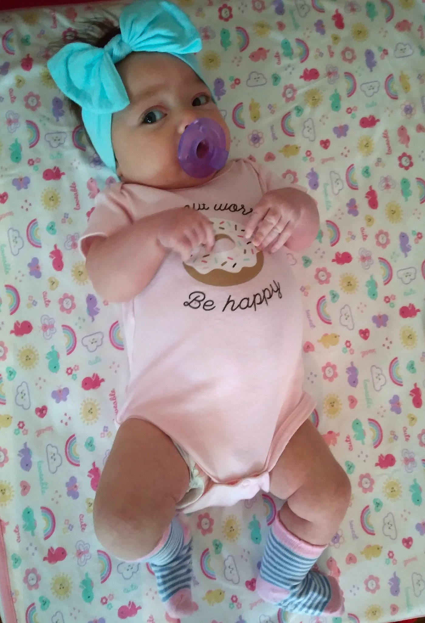 Korra joined the competition — help win amazing prizes! baby, baby_products, baby_safety, baby_toddler_clothing, child, fawn, head, headwear, magenta, pattern, person, pink, plush, product, skin, sleeve, stuffed_toy, teddy_bear, textile, toddler