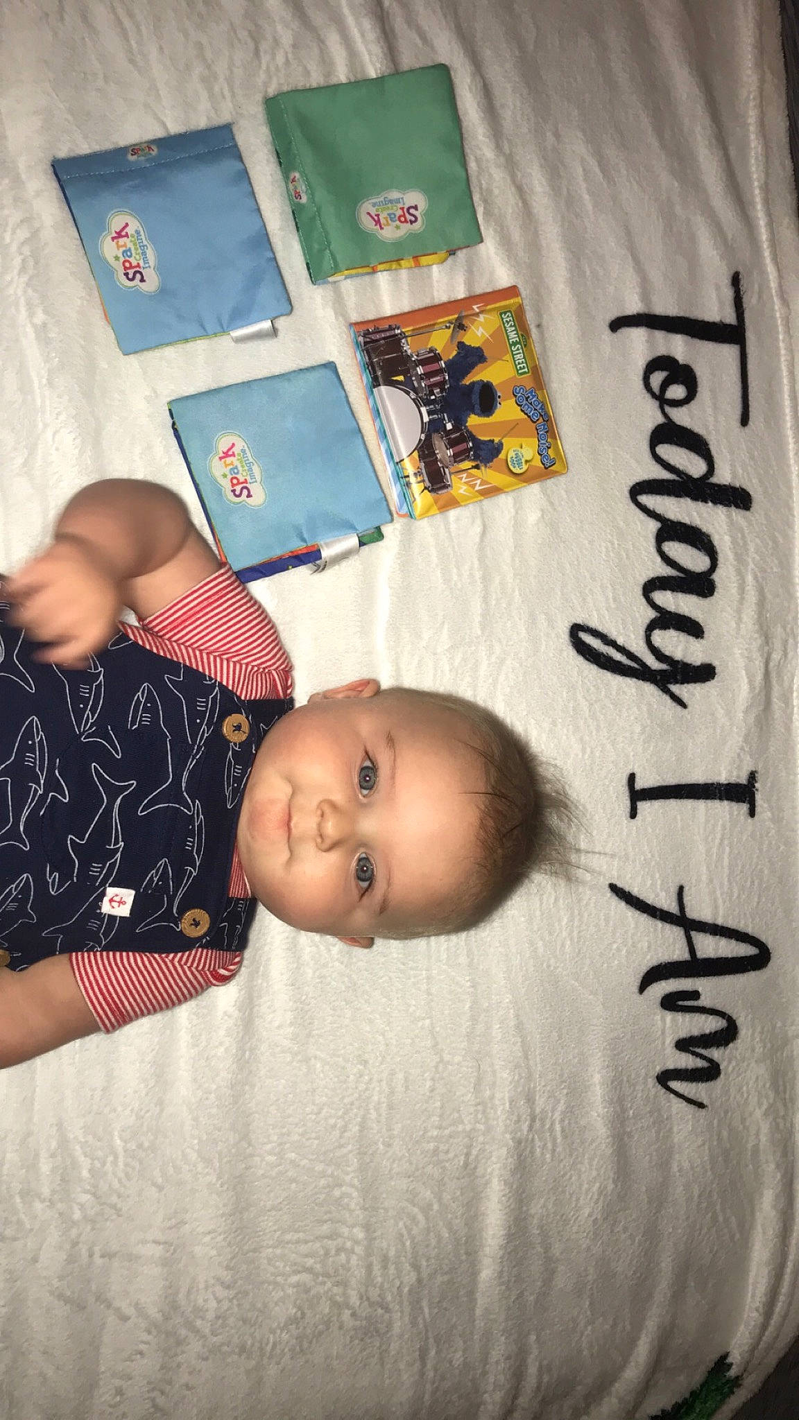 Xavier is registered to the contest to win money with this photo: baby, baby_products, baby_safety, baby_toddler_clothing, bed, bedding, bedtime, cheek, child, comfort, font, handwriting, happy, infant_bed, linens, person, room, textile, toddler