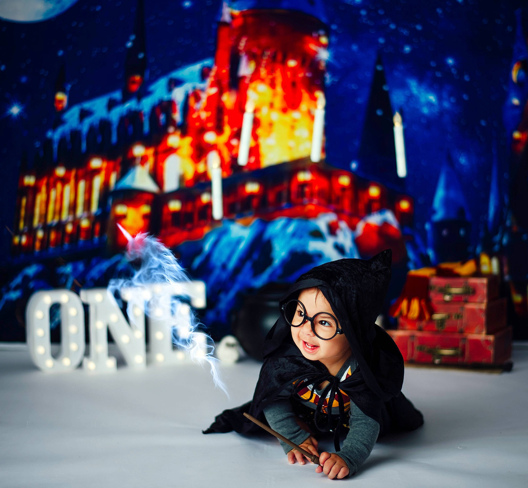 Charlie is registered to the contest to win money with this photo: animated_cartoon, animation, electric_blue, event, eyewear, fiction, fictional_character, freezing, fun, hat, leisure, night, person, sitting, snow, tree, winter