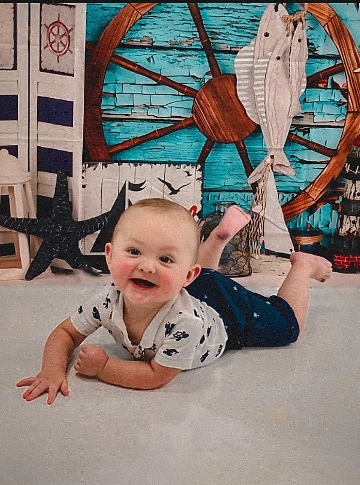 Jalen joined the competition — help win amazing prizes! art, baby, baby_toddler_clothing, child, cool, flooring, fun, hairstyle, happy, human_body, joy, leisure, person, pink, recreation, sitting, smile, t_shirt, textile, toddler