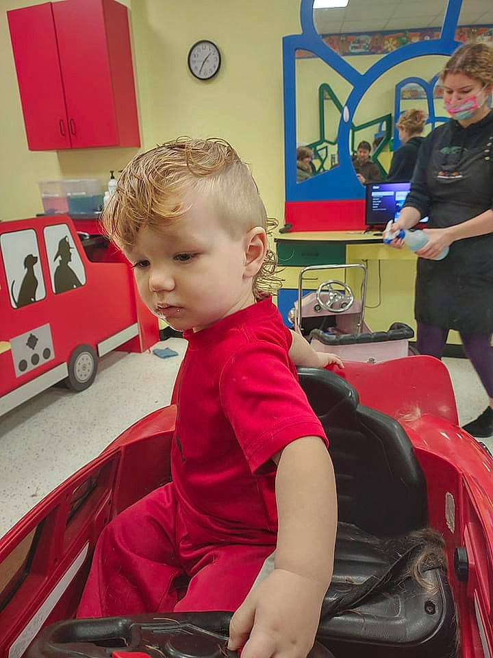 Braydon joined the competition — help win amazing prizes! backpack, bag, beauty_salon, blurred, chair, child, clock, event, flooring, fun, kindergarten, luggage_and_bags, motor_vehicle, person, play, room, sitting, tire, toddler, van