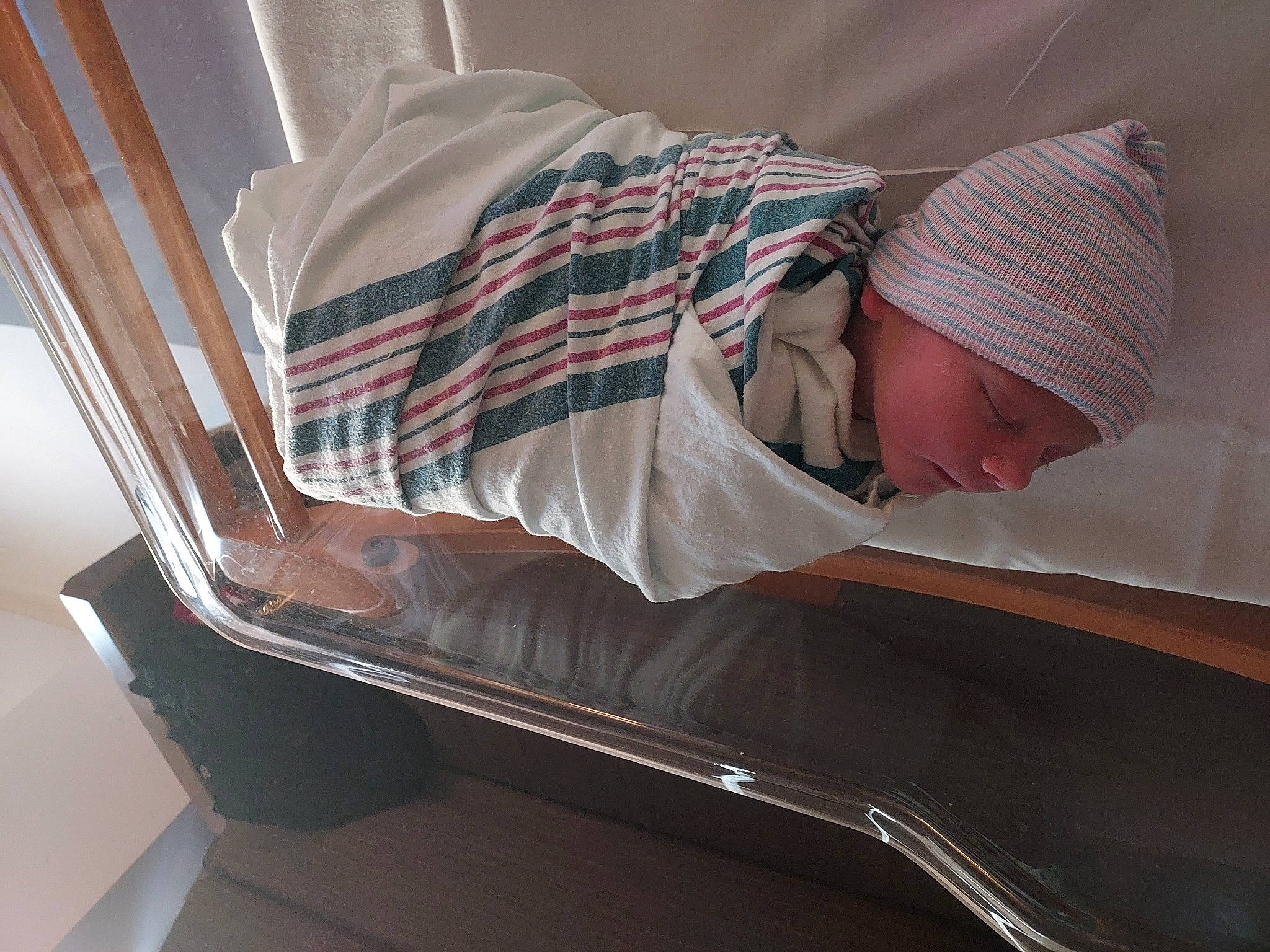 Briella joined the competition — help win amazing prizes! automotive_exterior, automotive_lighting, baby, baby_products, child, comfort, couch, headwear, linens, nap, pattern, person, personal_luxury_car, plaid, room, sitting, sleeve, tartan, toddler, vehicle_door