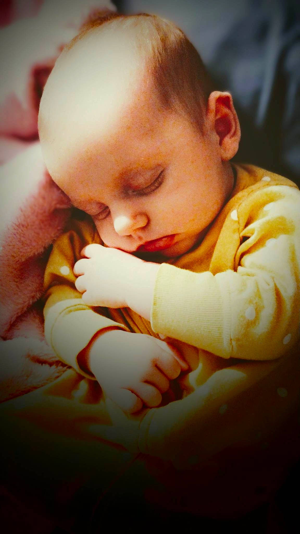 Briella is registered to the contest to win money with this photo: baby, baby_toddler_clothing, cheek, child, chin, comfort, ear, flash_photography, gesture, happy, human_body, iris, nail, nose, person, sitting, skin, thumb, toddler, tree