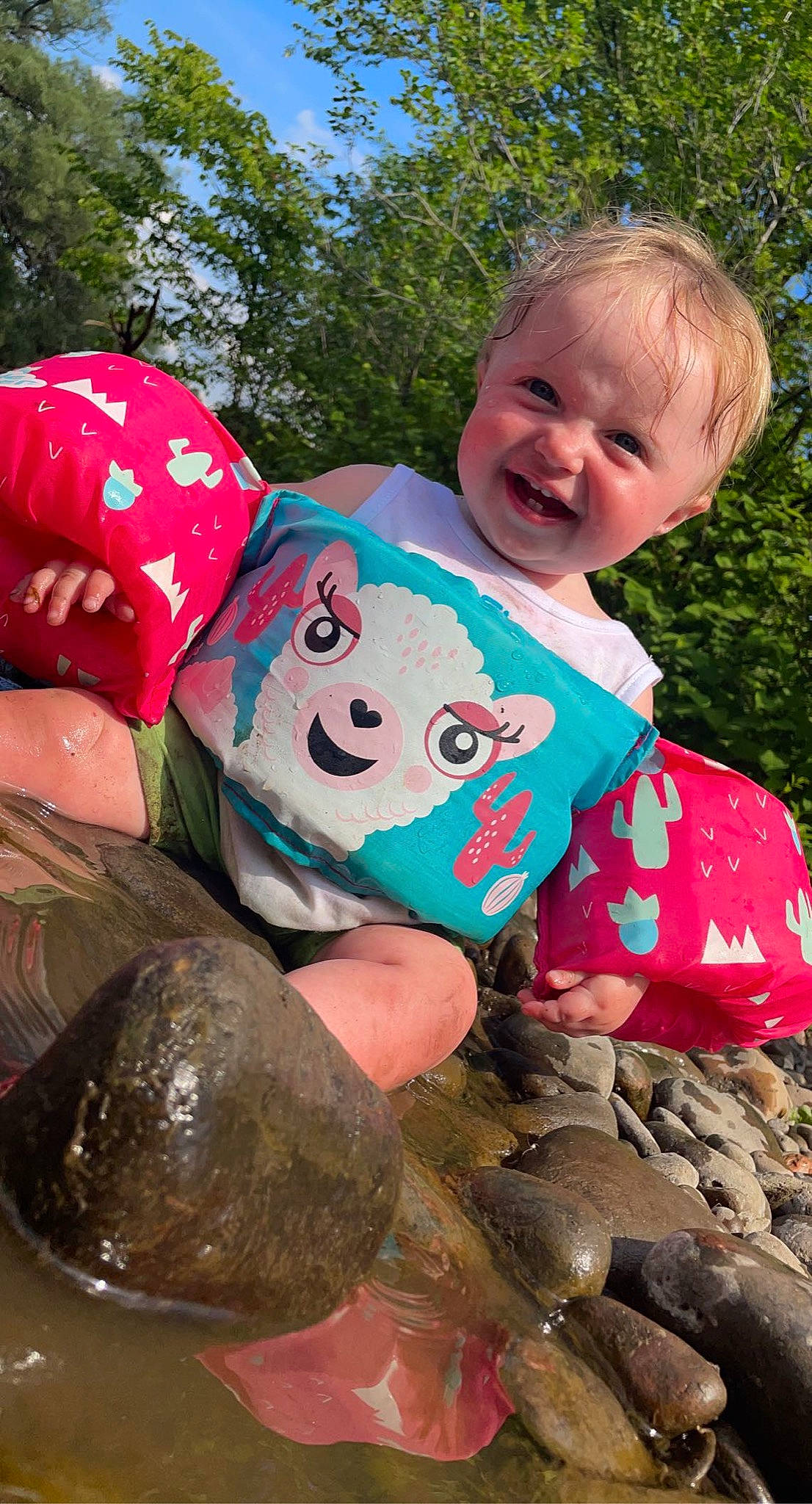 Alani is registered to the contest to win money with this photo: baby_toddler_clothing, child, facial_expression, fun, grass, hairstyle, happy, head, leisure, nature, people_in_nature, person, pink, play, recreation, smile, soil, t_shirt, toddler, toy