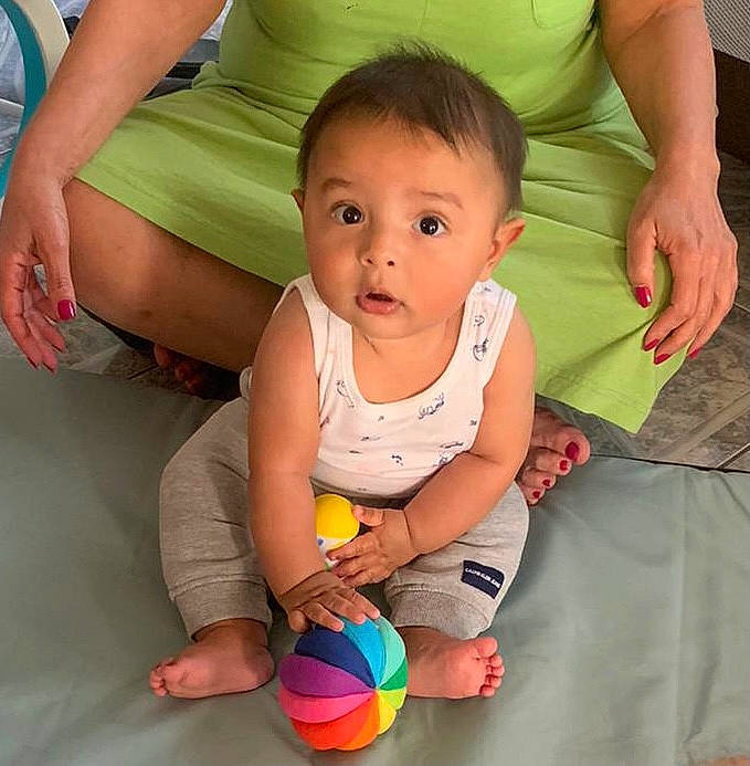 Jose joined the competition — help win amazing prizes! arm, baby, baby_toddler_clothing, cheek, eye, face, finger, fun, gesture, green, hair, happy, head, human_body, iris, joint, nose, person, product, skin