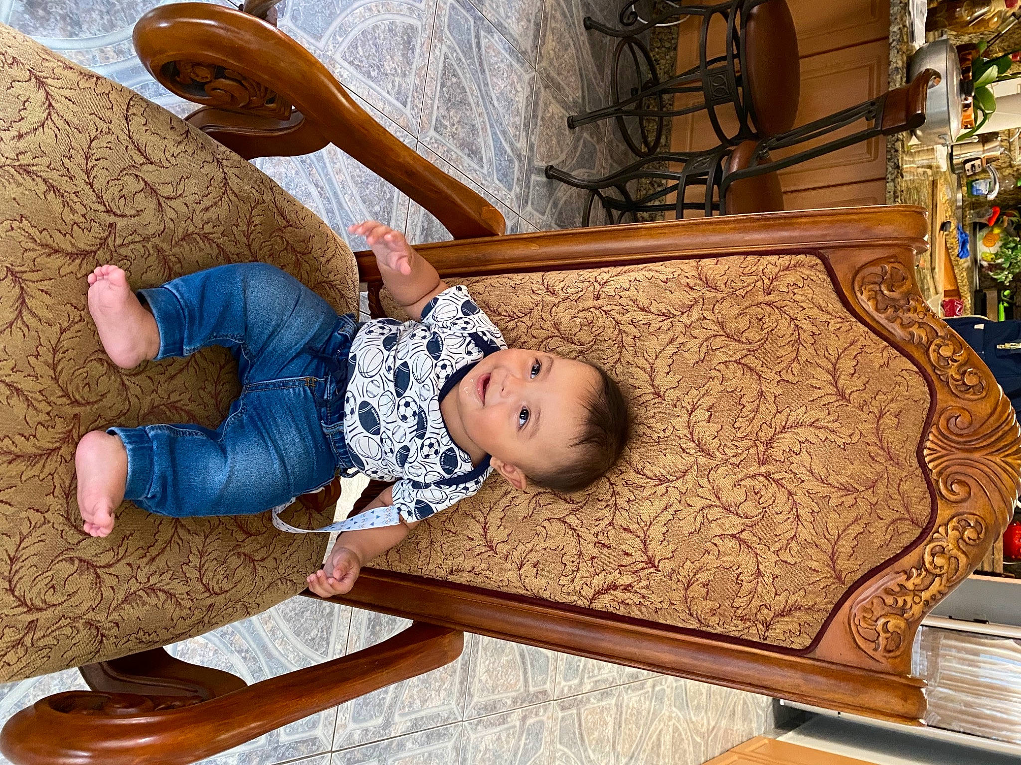 Jose joined the competition — help win amazing prizes! baby, baby_toddler_clothing, child, comfort, flooring, hardwood, hat, joy, leg, leisure, musical_instrument, pattern, people, person, product, room, sitting, sock, toddler, varnish