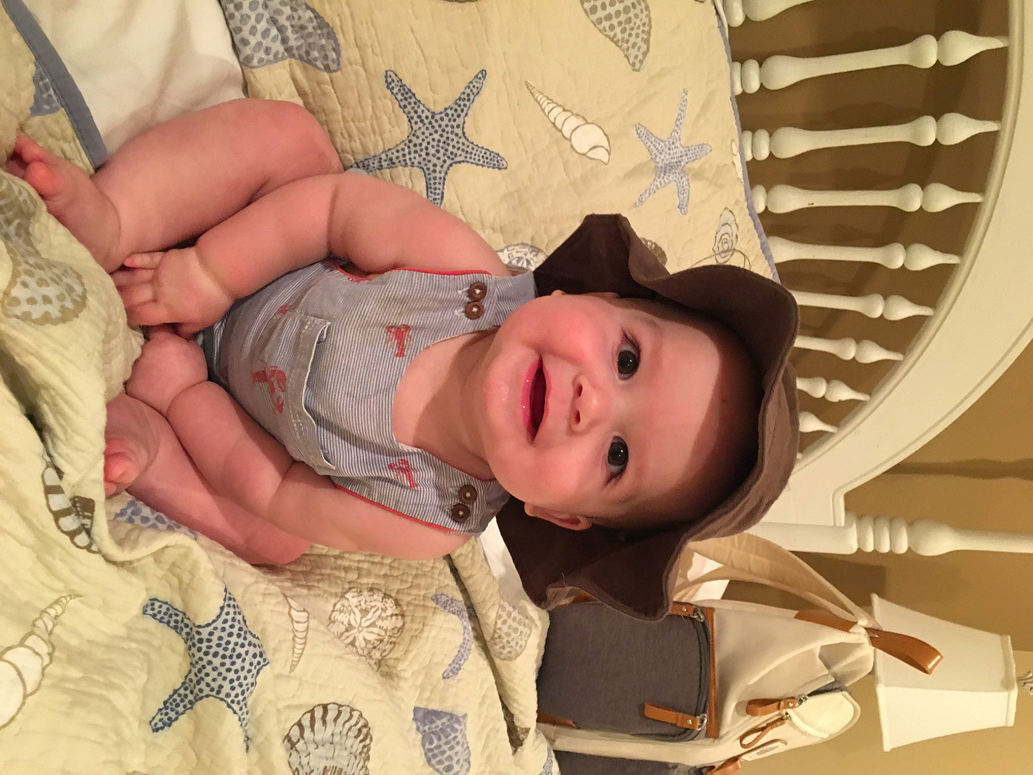 Stetson is registered to the contest to win money with this photo: child, comfort, eye, eyelash, facial_expression, fashion_accessory, fun, happy, hat, head, headgear, headwear, human_body, joy, mouth, pattern, person, skin, smile, sun_hat