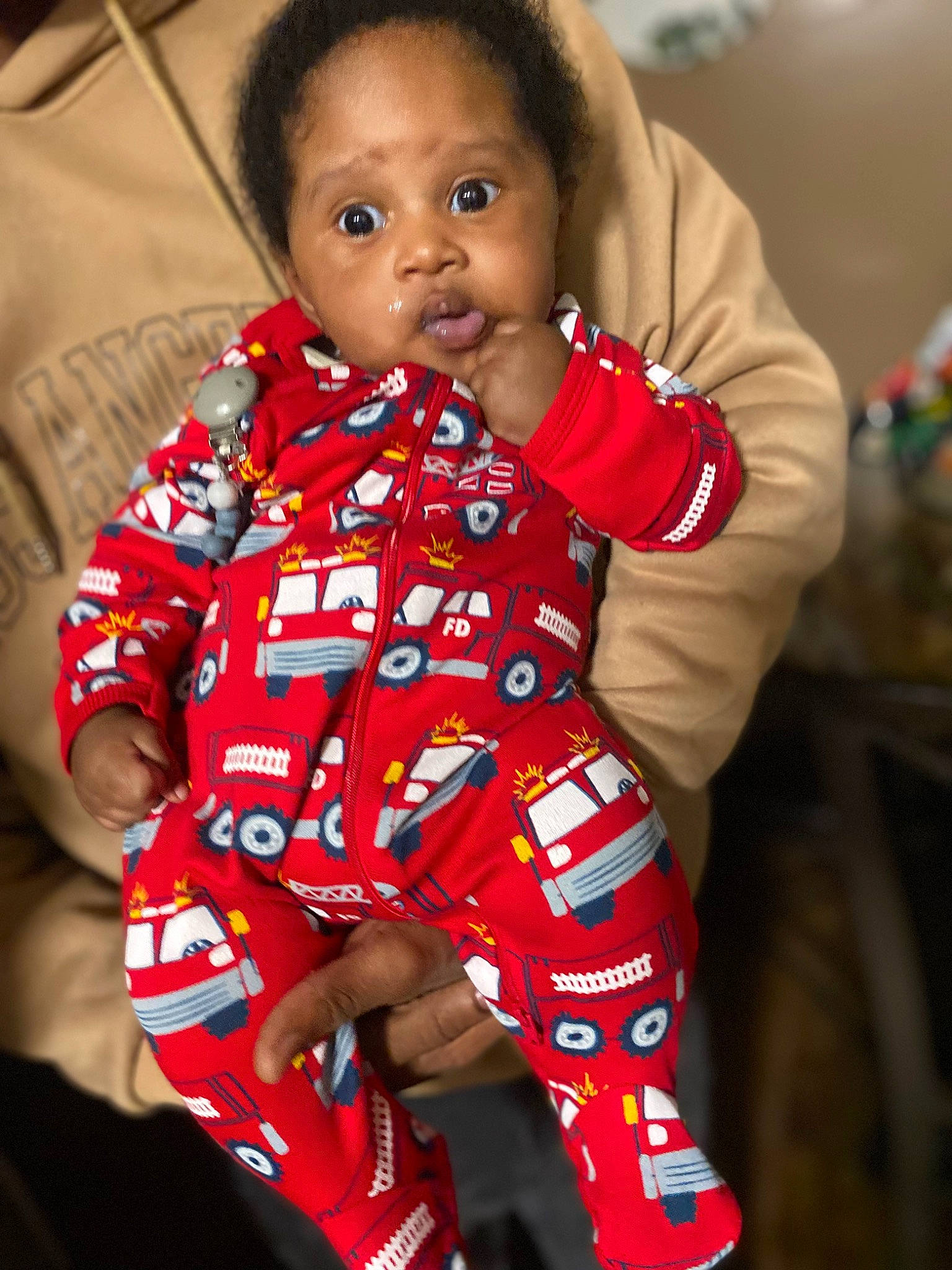 Josiah Mcmurtry is registered to the contest to win money with this photo: baby, baby_toddler_clothing, carmine, cheek, child, collar, comfort, event, fun, hairstyle, happy, head, neck, nightwear, pattern, person, sitting, skin, sleeve, t_shirt