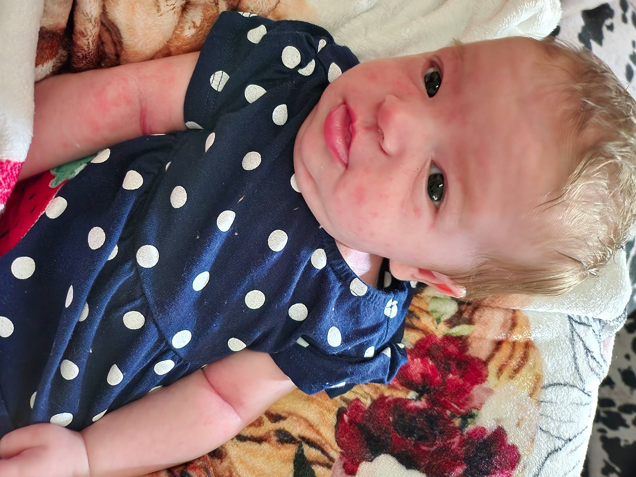 Adalee is registered to the contest to win money with this photo: baby, baby_toddler_clothing, beauty, child, collar, fashion_accessory, finger, gesture, hand, happy, linens, nail, pattern, person, pink, plaid, sitting, skin, sleeve, textile