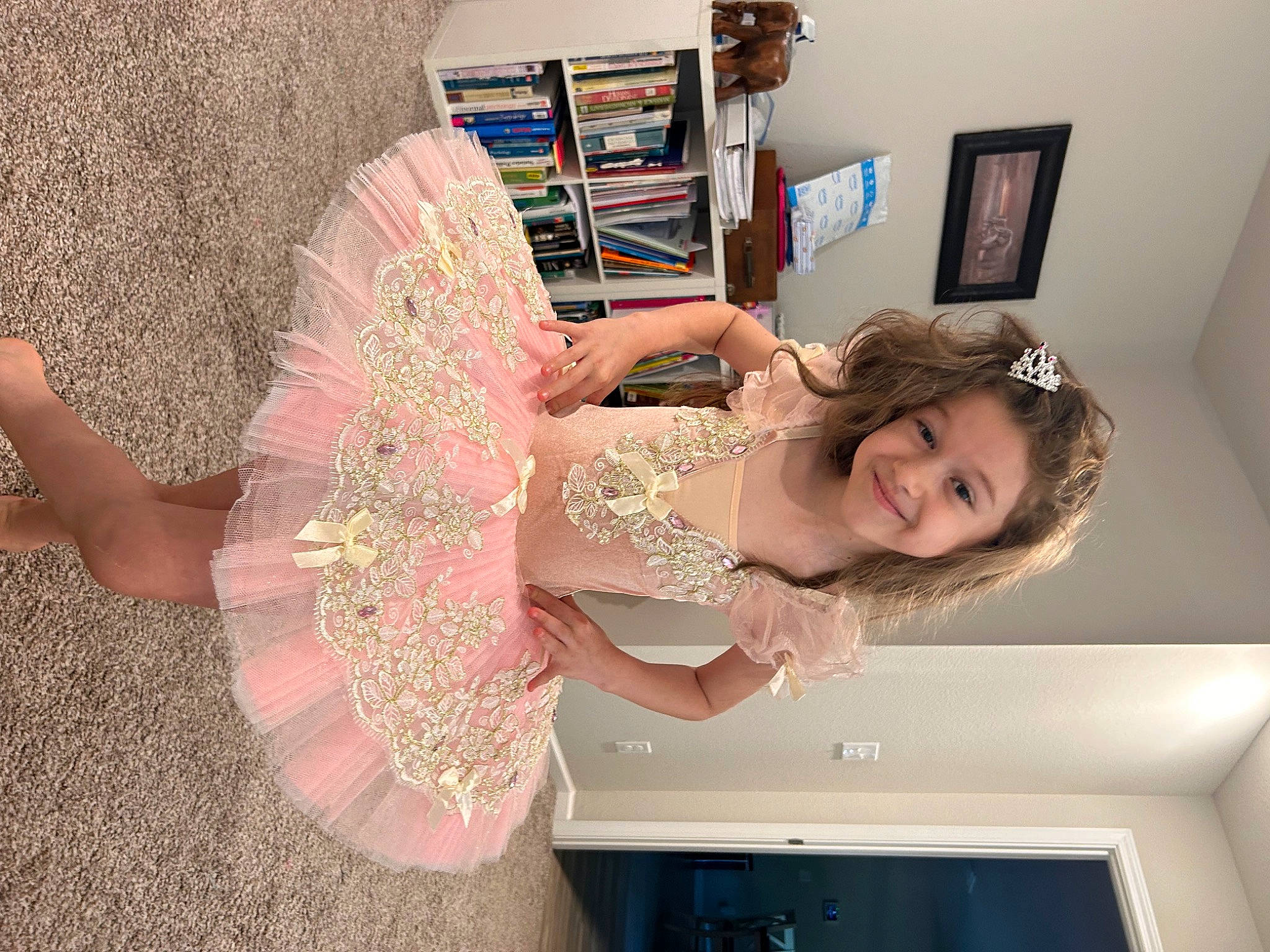 Ainara is registered to the contest to win money with this photo: art, child, day_dress, dress, fashion_design, fun, happy, human_leg, jewellery, joy, magenta, pattern, peach, person, picture_frame, pink, room, shelf, smile, waist