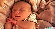 Maylee is registered to the contest to win money with this photo: newborn, baby, sleeping, blanket, soft, cozy, infant, peaceful, cute, wrapped, comfort, child, closeup, portrait, resting, warm, indoors, toddler, sleep, babyclothes