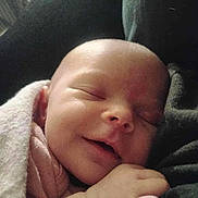 Oakley joined the competition — help win amazing prizes! baby, sleeping, smile, blanket, hand, face, newborn, infant, soft, comfort, peaceful, closeup, skin, cute, child, portrait, rest, cozy, toddler, nap