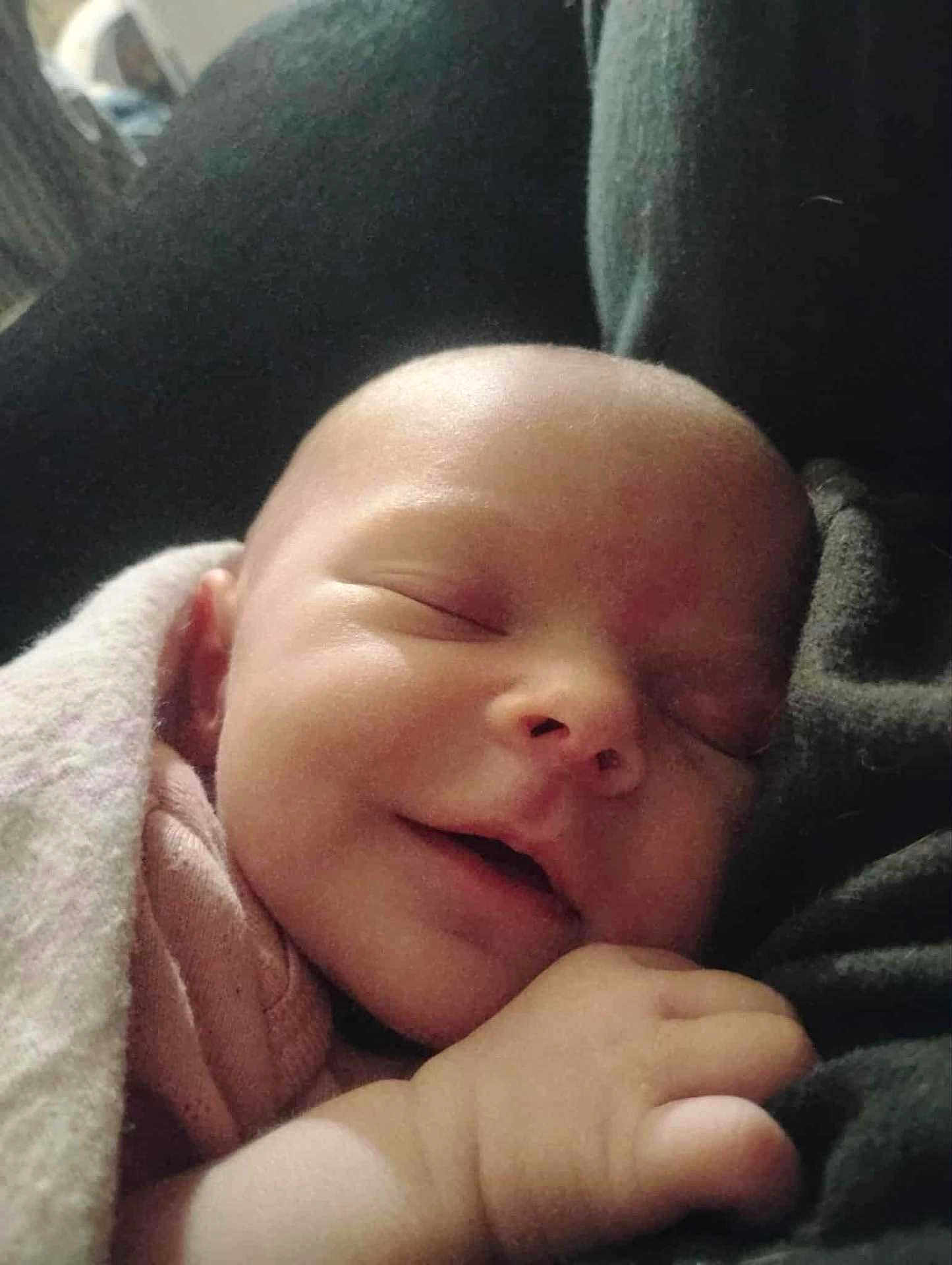 Oakley joined the competition — help win amazing prizes! baby, sleeping, smile, blanket, hand, face, newborn, infant, soft, comfort, peaceful, closeup, skin, cute, child, portrait, rest, cozy, toddler, nap