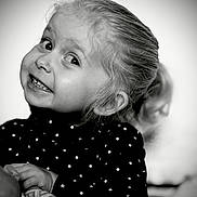 Lindsay Sabrina participe au concours pour gagner de l'argent avec cette photo : child, girl, smile, face, portrait, black_and_white, polka_dot, hair, happy, cute, young, expression, toddler, clothing, person, indoors, childhood, emotion, head, funny