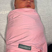 Everleigh is registered to the contest to win money with this photo: newborn, baby, swaddle, pink, sleeping, hat, blanket, soft, resting, peaceful, infant, cute, wrapped, face, skin, portrait, indoors, child, cozy, sleep