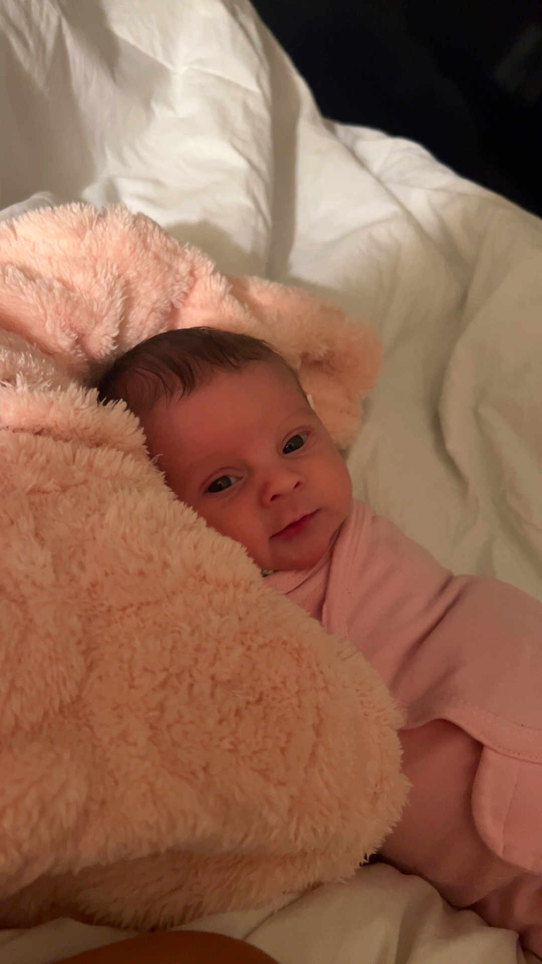 Everleigh joined the competition — help win amazing prizes! baby, blanket, pink, soft, cozy, bed, bedding, face, infant, smile, cute, child, sleepwear, warm, rest, comfort, young, newborn, portrait, indoors