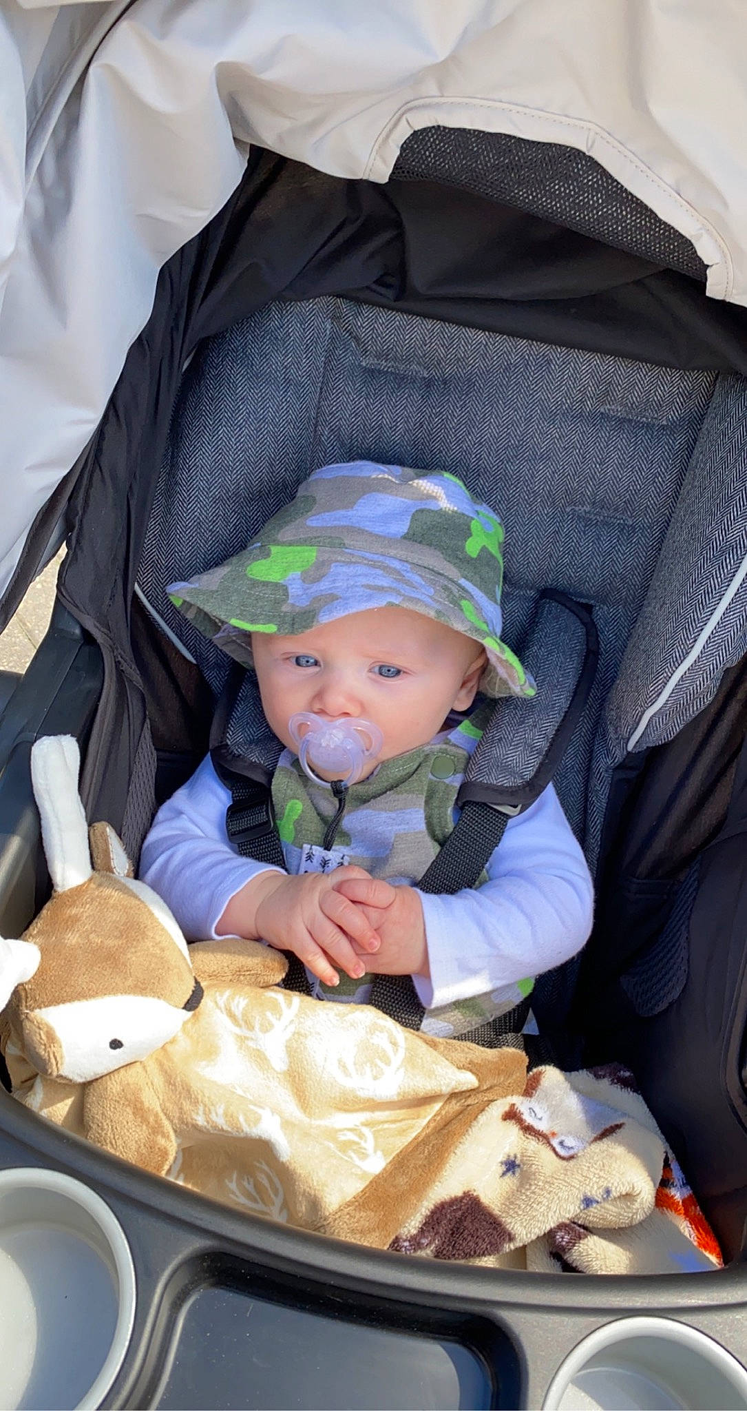 Alec is registered to the contest to win money with this photo: baby, baby_carriage, baby_products, baby_safety, baby_toddler_clothing, bowl, child, comfort, comfort_food, cooking, hat, headgear, headwear, kitchen_utensil, person, product, sitting, spoon, sun_hat, tableware