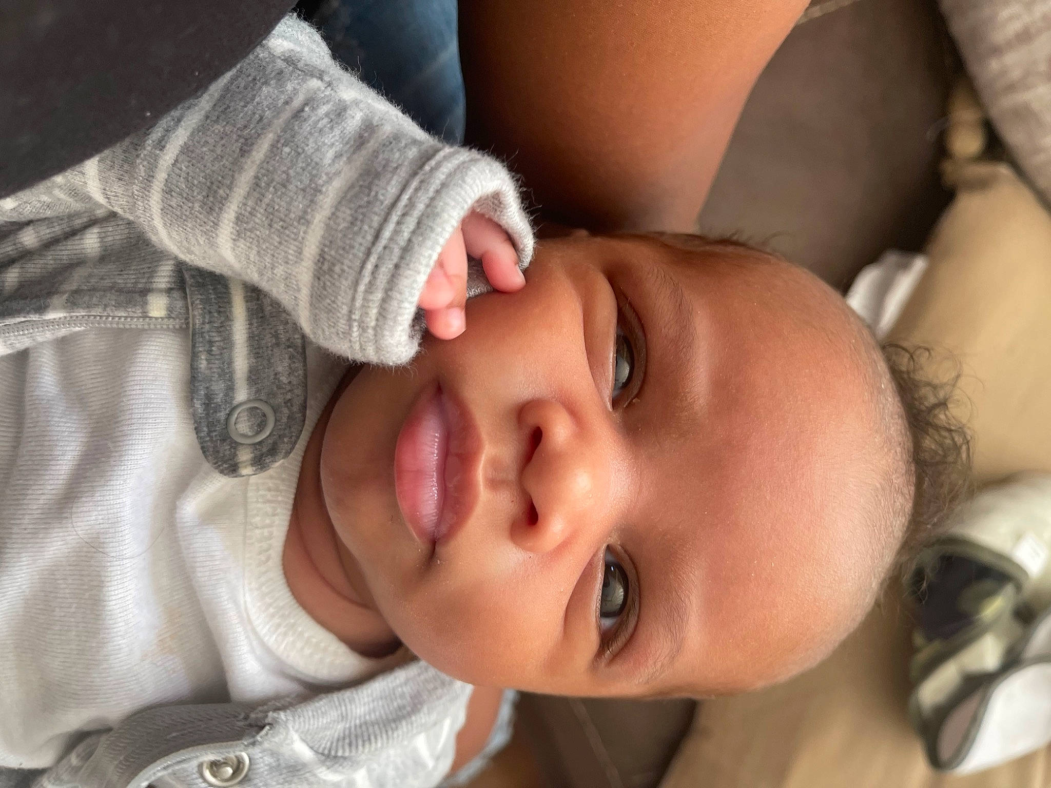 Jakari is registered to the contest to win money with this photo: baby, baby_products, baby_toddler_clothing, cheek, child, chin, comfort, eyelash, flash_photography, fun, happy, lip, mouth, nose, person, portrait_photography, skin, sleep, sleeve, smile