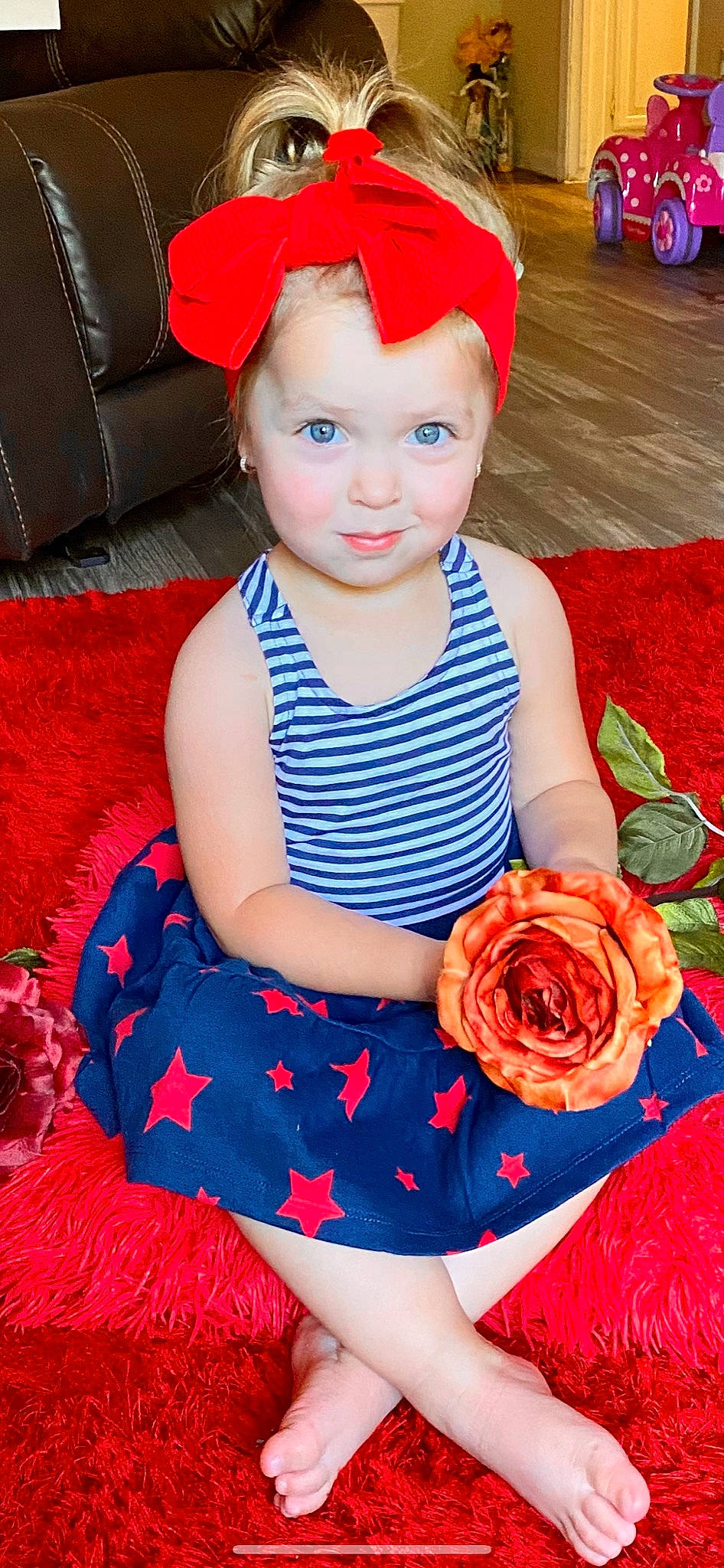 Briana joined the competition — help win amazing prizes! baby, baby_bloomers, baby_toddler_clothing, child, child_model, costume, costume_accessory, hair_accessory, headband, headgear, headwear, person, red, smile, toddler