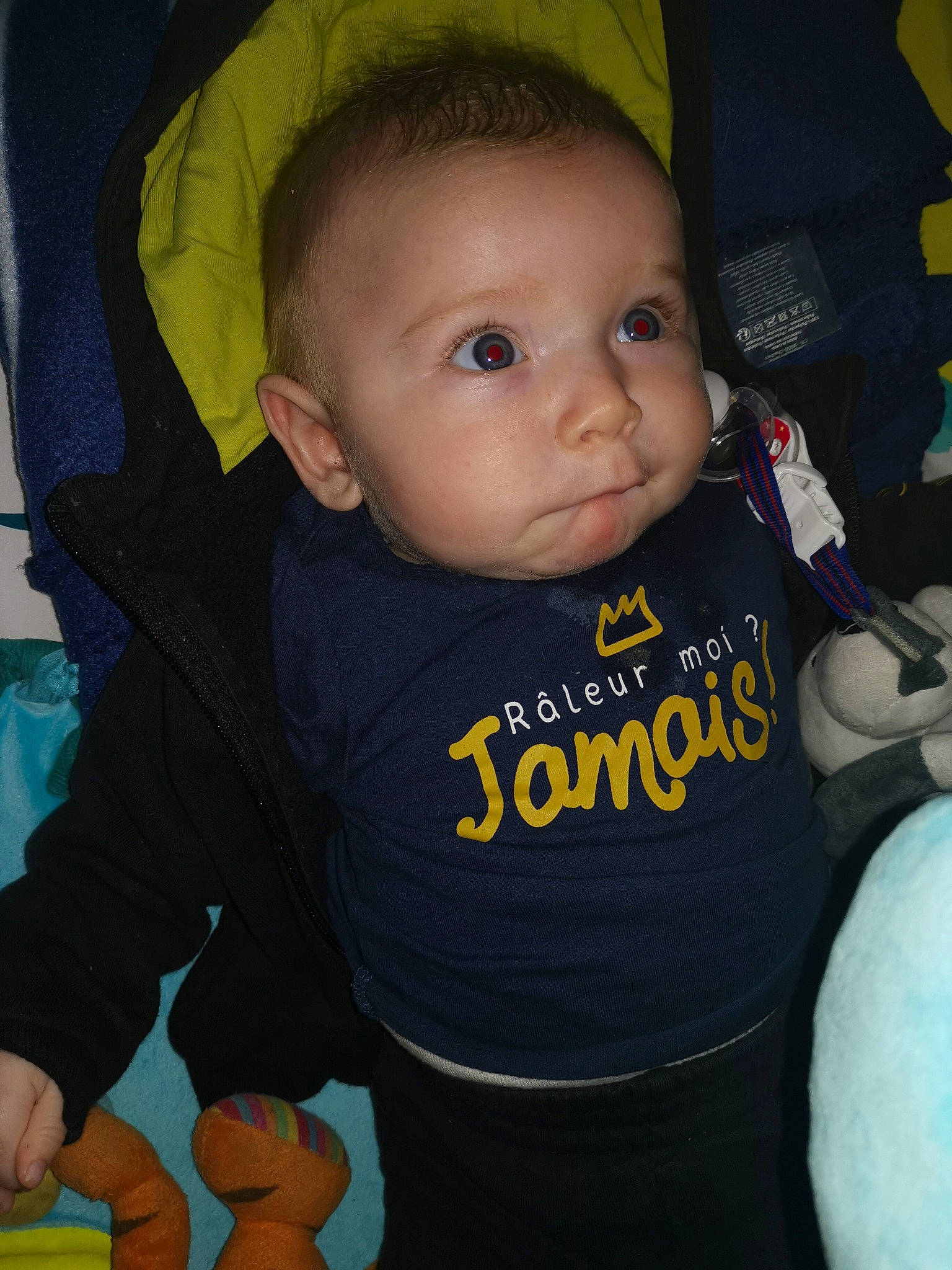 Estevann participe au concours pour gagner de l'argent avec cette photo : baby, baby_carriage, baby_products, baby_toddler_clothing, cheek, child, cool, ear, eye, face, head, hoodie, iris, lip, person, product, skin, smile, toddler, yellow