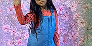 Abbigail joined the competition — help win amazing prizes! blue_overalls, casual_clothing, child, colorful, confident, cool, expression, fashion, floor, floral_pattern, girl, indoor, long_hair, orange_shirt, portrait, posing, quilt_background, standing, sunglasses, young