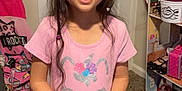 Abbigail joined the competition — help win amazing prizes! carpet, child, clothing, cute, girl, holding, home, indoor, long_hair, person, pink_shirt, rainbow_skirt, room, shelf, shoes, smiling, standing, towel, toy_box, unicorn