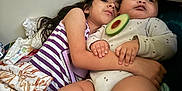 Noah is registered to the contest to win money with this photo: child, baby, sibling, hug, bed, blanket, avocado_toy, cozy, indoor, cute, family, comfort, cuddle, person, clothing, toddler, young, laying, protective, warm