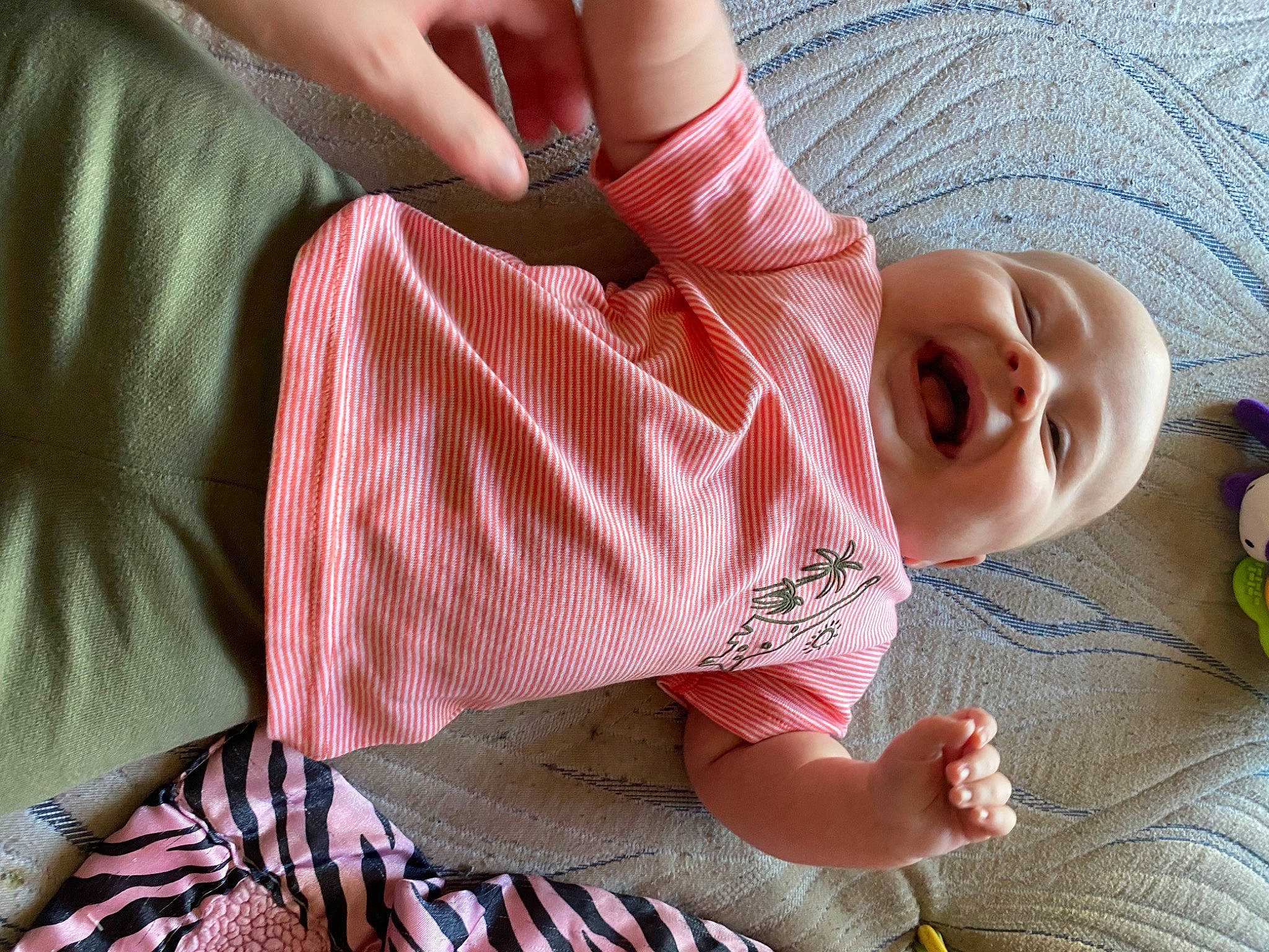 Pennelope joined the competition — help win amazing prizes! baby, baby_toddler_clothing, comfort, finger, hand, human_body, joint, leg, lip, mouth, nail, nose, person, pink, plaid, red, skin, sleeve, tartan, thumb