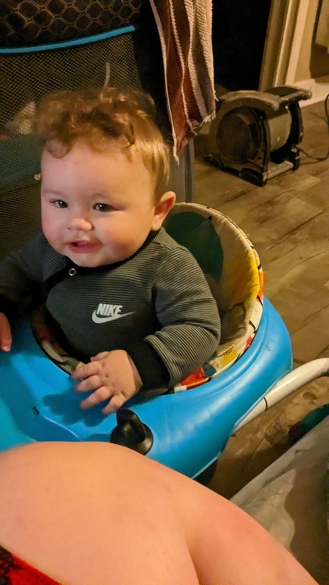 Christopher is registered to the contest to win money with this photo: baby, baby_products, chair, cheek, child, electric_blue, finger, fun, happy, human_body, lap, leisure, mouth, person, play, recreation, sitting, skin, smile, thigh