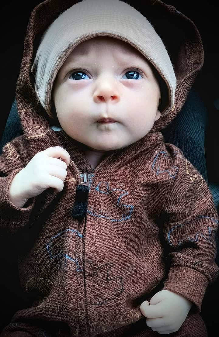 Sequoia is registered to the contest to win money with this photo: baby, baby_toddler_clothing, cap, cheek, child, collar, eyelash, fashion_accessory, flash_photography, fur, headgear, headwear, iris, lip, nose, organ, outerwear, person, skin, sleeve