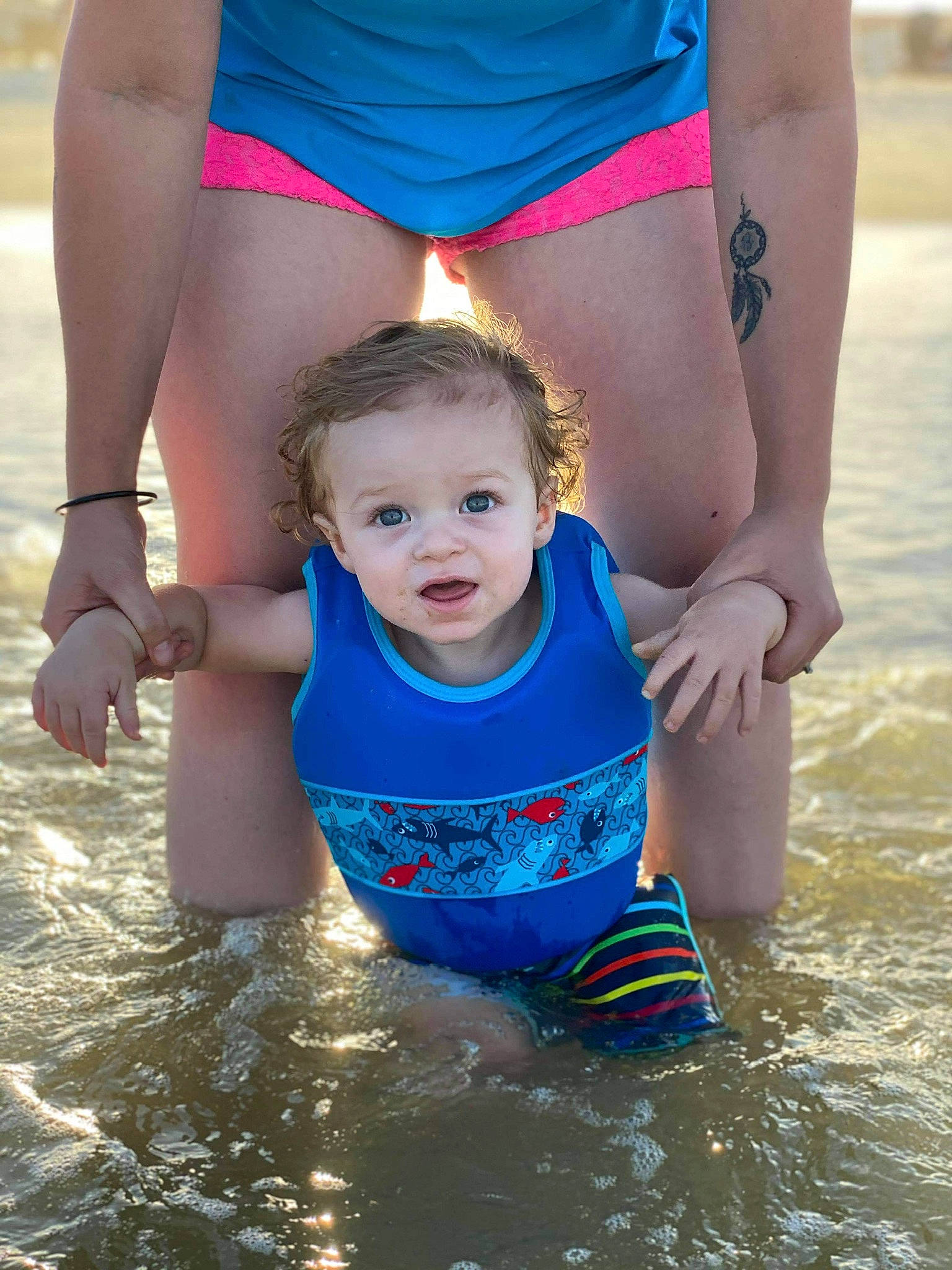 Ryver is registered to the contest to win money with this photo: child, fun, leg, leisure, person, play, recreation, smile, summer, swimwear, thigh, toddler, vacation, water