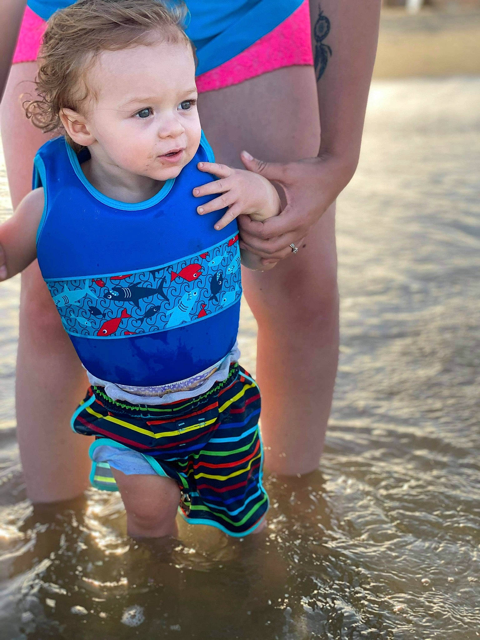 Ryver is registered to the contest to win money with this photo: baby, child, fun, happy, leisure, person, play, recreation, sand, smile, summer, swimwear, t_shirt, toddler, vacation, water, water_park