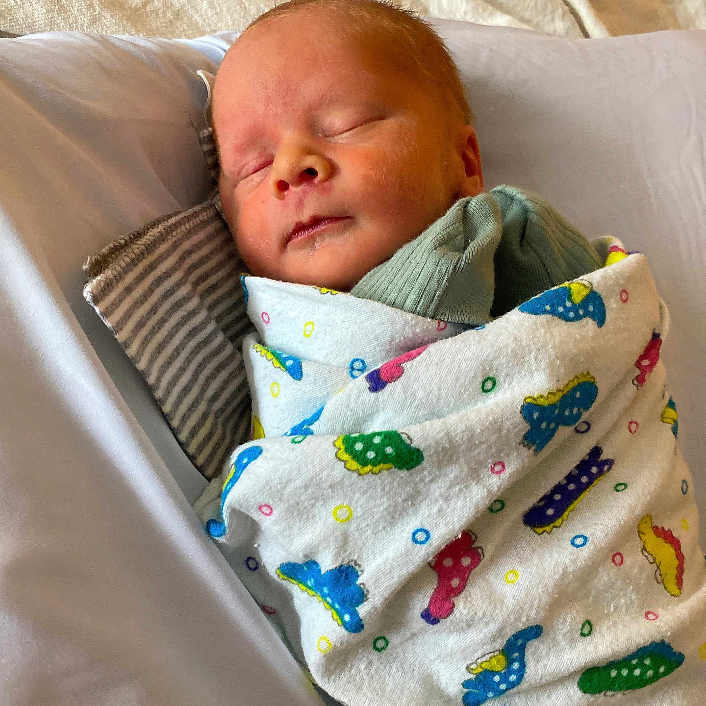 Dallas is registered to the contest to win money with this photo: architecture, baby, bed, blanket, building, couch, crib, cushion, face, furniture, head, homedecor, hospital, newborn, person, photography, portrait, quilt, sleeping, towel