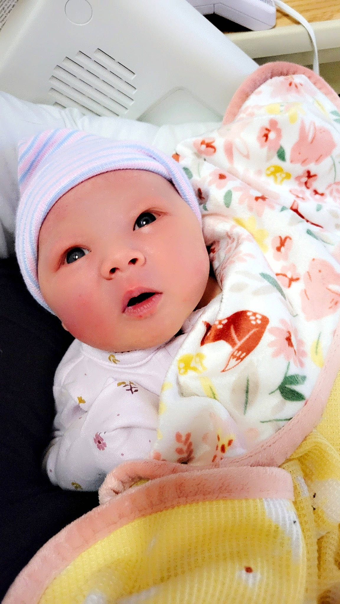 Hope is registered to the contest to win money with this photo: baby, baby_products, baby_toddler_clothing, cap, cheek, child, collar, comfort, face, happy, hat, headwear, linens, person, pink, portrait_photography, product, skin, sleeve, textile