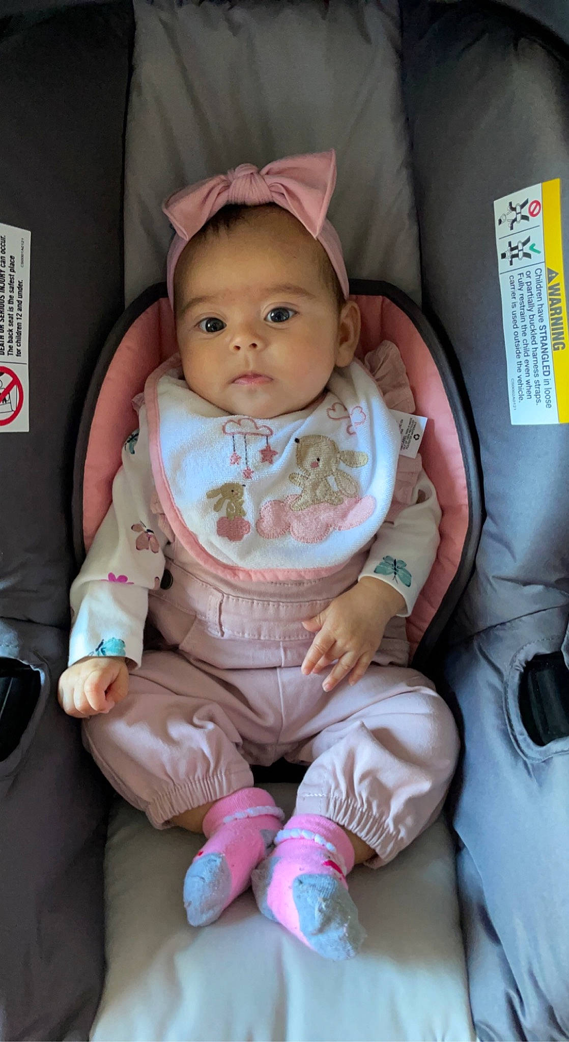 Kamilah joined the competition — help win amazing prizes! baby, baby_carriage, baby_in_car_seat, baby_products, baby_safety, baby_toddler_clothing, bib, cheek, child, comfort, eyelash, finger, iris, lip, nose, person, pink, skin, sleeve, smile