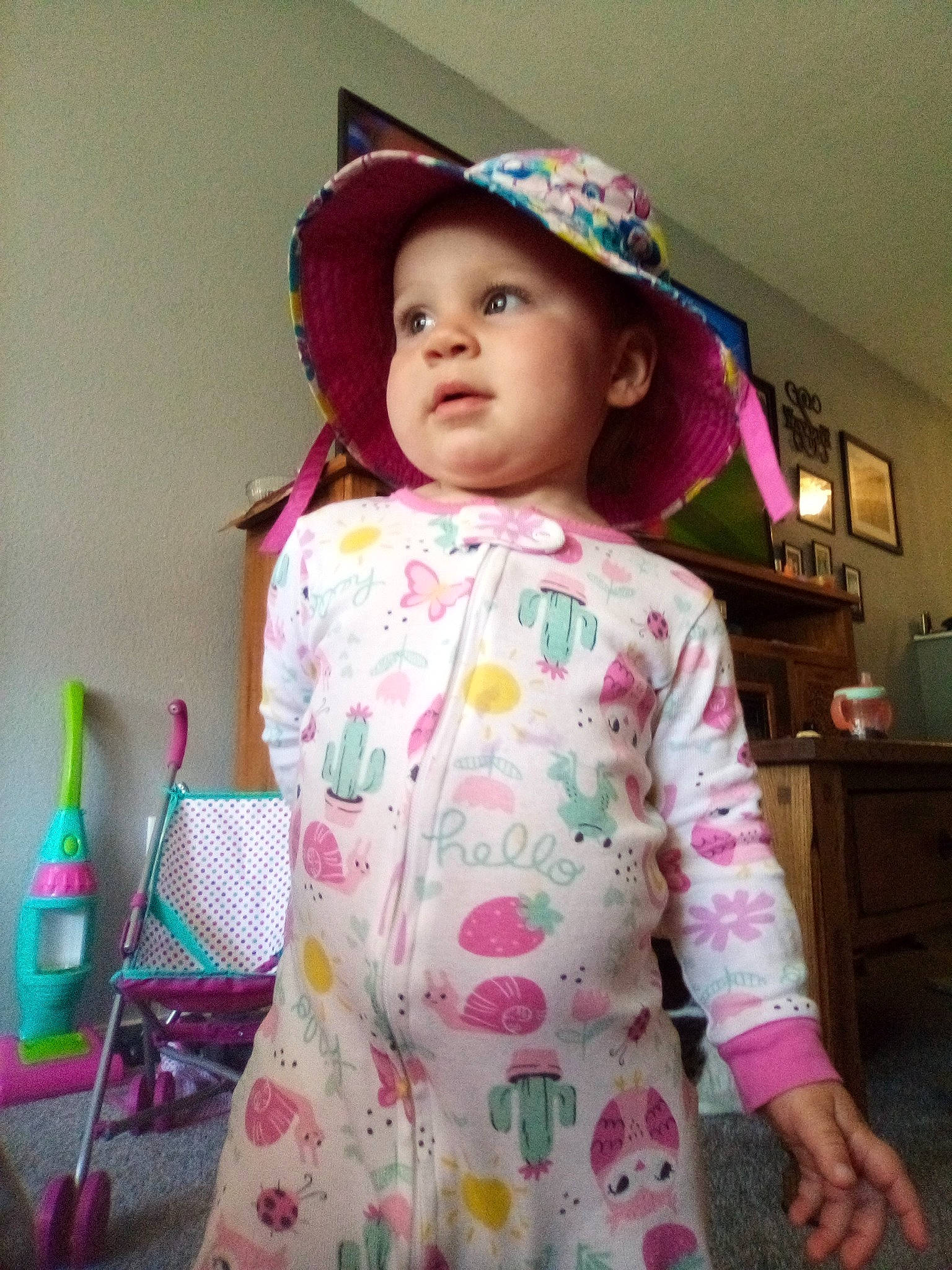 Eleanor joined the competition — help win amazing prizes! child, dress, fashion_accessory, hat, headgear, headwear, magenta, outerwear, person, pink, play, skin, sleeve, smile, sun_hat, toddler