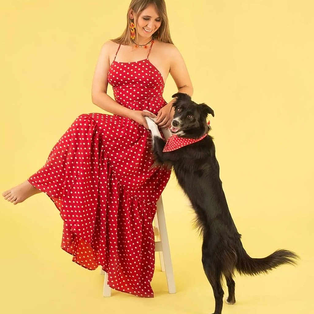 Susana Cantu joined the competition — help win amazing prizes! adult, animal, canine, clothing, dog, dress, eveningdress, face, female, formalwear, furniture, happy, head, pajamas, pattern, person, pet, sitting, smile, woman