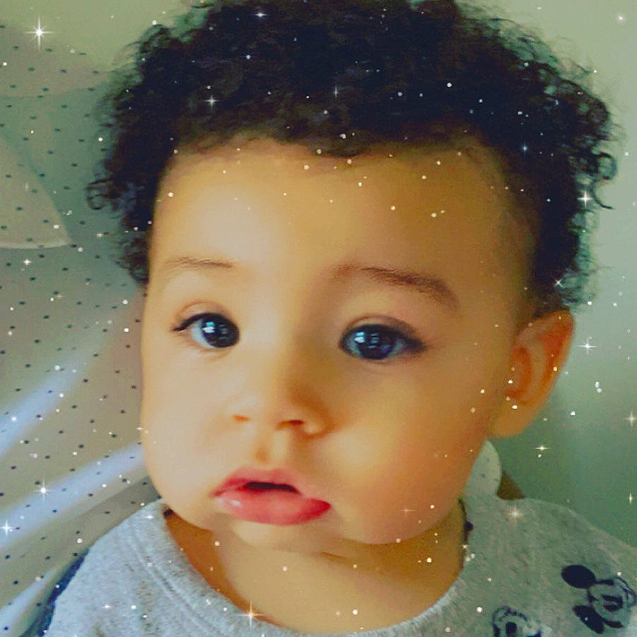 Milo is registered to the contest to win money with this photo: baby_toddler_clothing, black_hair, cheek, child, chin, eyebrow, eyelash, forehead, hairstyle, iris, jaw, lip, neck, nose, organ, person, portrait, shoulder, skin, temple