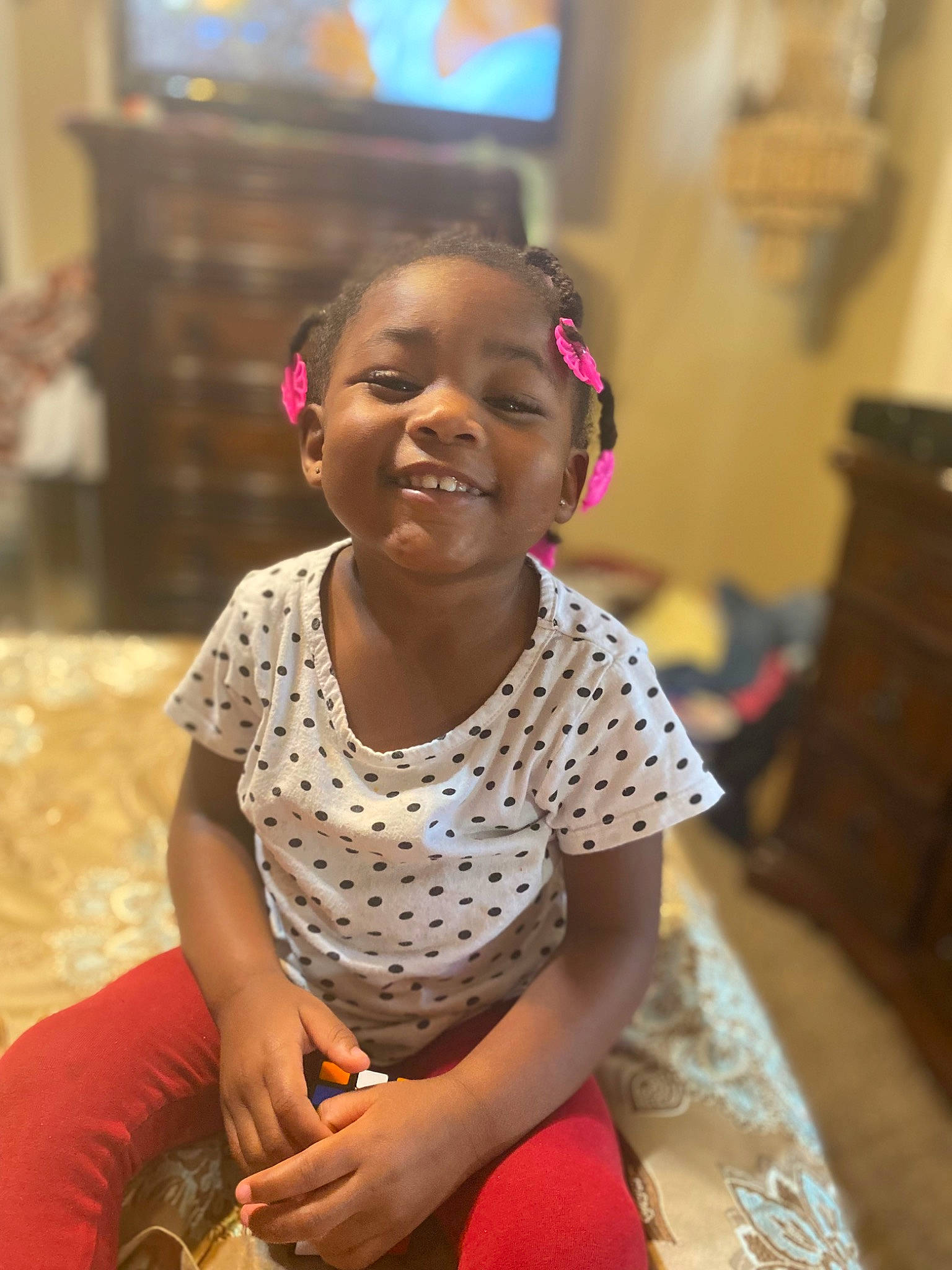 Genesis is registered to the contest to win money with this photo: baby, baby_toddler_clothing, cabinetry, cheek, chest_of_drawers, child, drawer, event, flooring, fun, happy, head, joy, leisure, person, room, sitting, skin, smile, toddler