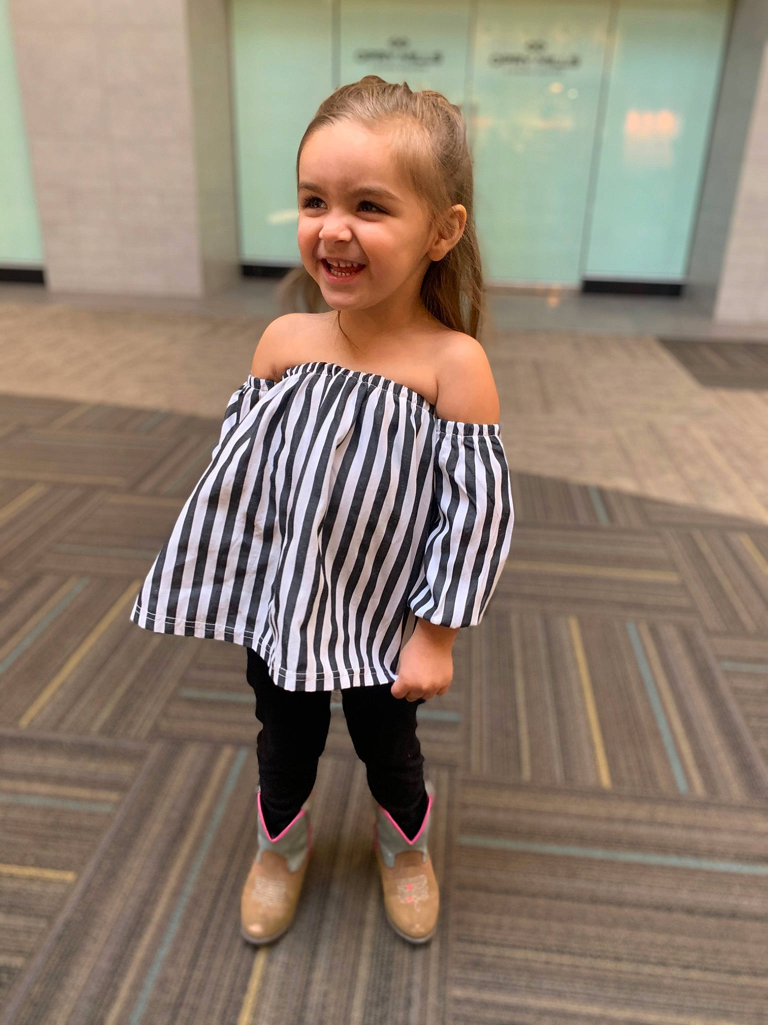 Madyson is registered to the contest to win money with this photo: baby_toddler_clothing, dress, floor, flooring, happy, hardwood, joint, joy, knee, neck, person, shoe, sleeve, smile, standing, street_fashion, thigh, toddler, trunk, waist