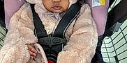 Akira joined the competition — help win amazing prizes! baby, infant, child, pink_clothing, headband, fluffy_outfit, car_seat, shopping_cart, toy, hand, face, eyes, seatbelt, indoor, shopping, curious, cute, portrait, warm_clothing, closeup