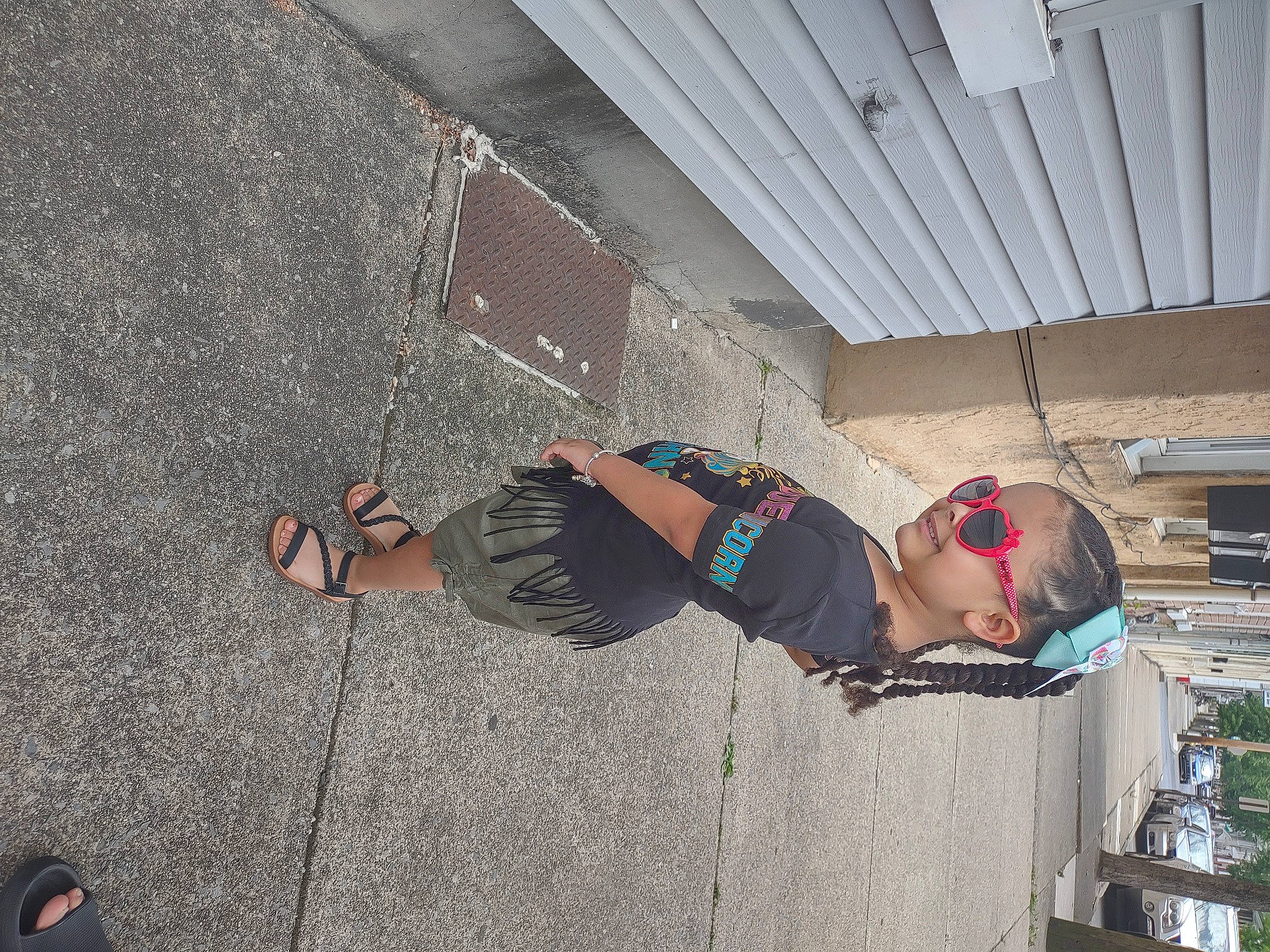 Genesis is registered to the contest to win money with this photo: adventure, asphalt, cement, cobblestone, concrete, flooring, fun, human_leg, leisure, outdoor_shoe, person, recreation, road_surface, sidewalk, street, t_shirt, walking_shoe, wood