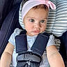 Nyelle is registered to the contest to win money with this photo: baby, child, car_seat, headband, pink_bow, safety_harness, white_shirt, infant, seat, cute, portrait, young_child, straps, car_safety, baby_face, expression, indoors, closeup, person, seat_cushion