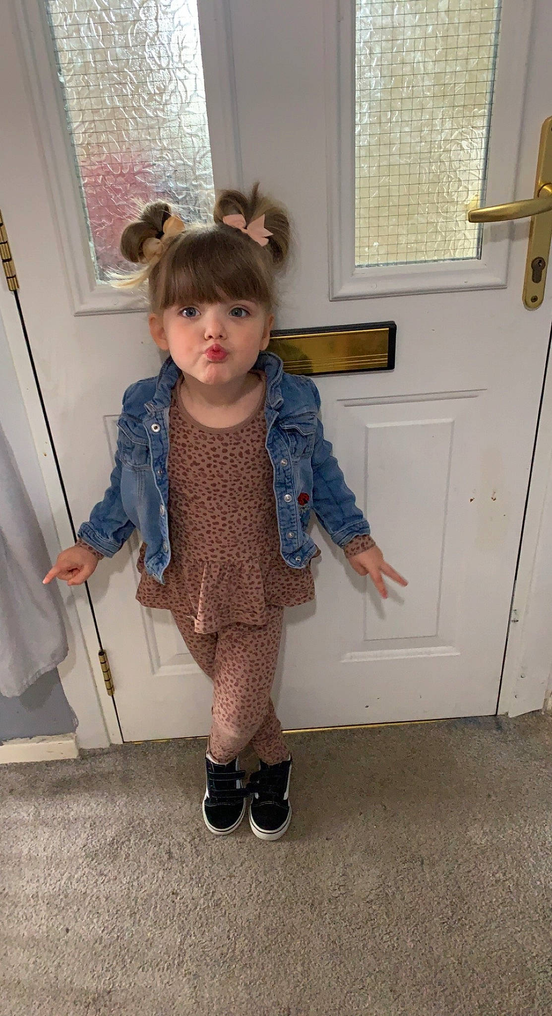 Maisie is registered to the contest to win money with this photo: baby_toddler_clothing, bag, boot, child, denim, electric_blue, fashion_accessory, fashion_design, flooring, fun, fur, human_leg, knee, leg, luggage_and_bags, pattern, person, sitting, sleeve, sock