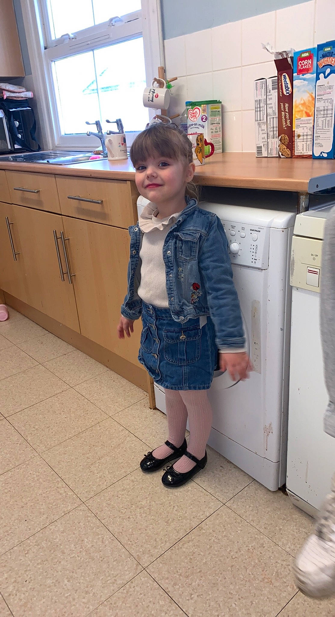 Maisie joined the competition — help win amazing prizes! boot, cabinetry, countertop, cupboard, drawer, electric_blue, fashion_design, flooring, home_appliance, homemaker, joy, kitchen, kitchen_appliance, major_appliance, pattern, person, refrigerator, room, sandal, smile