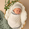 newborn, baby, sleeping, wrapped, basket, blanket, hat, eucalyptus, greenery, cozy, soft, white, portrait, infant, peaceful, cute, resting, headwear, natural, indoors