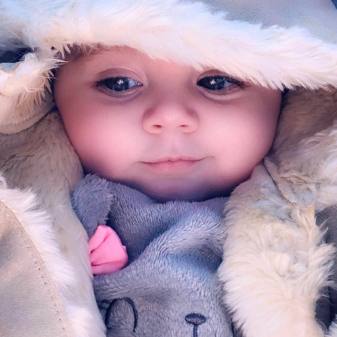 Peggy joined the competition — help win amazing prizes! baby, cheek, child, doll, eye, eyebrow, face, fur, fur_clothing, head, headwear, iris, lip, nose, person, pink, skin, smile, toddler, winter
